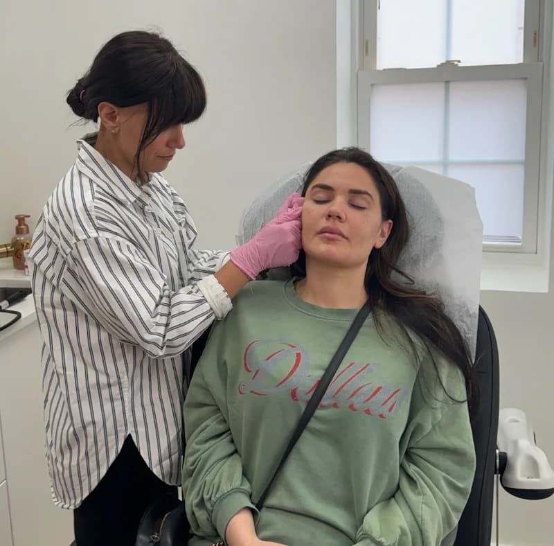 Dr Caridi and a patient in consultation.